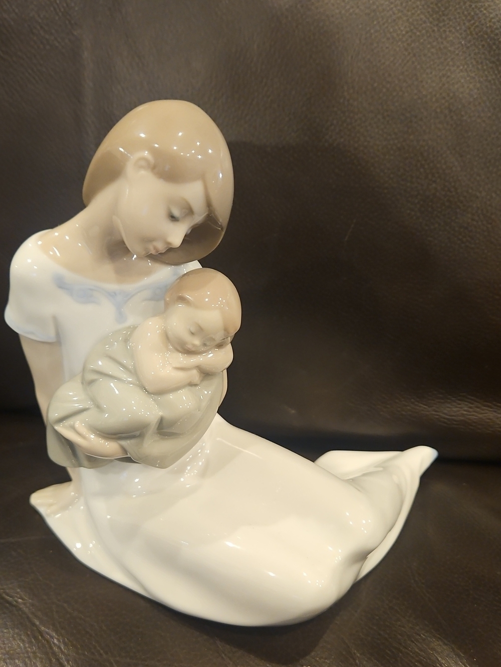Lladro Porcelain Mother & Child Figurine in White With Pastel Colors.